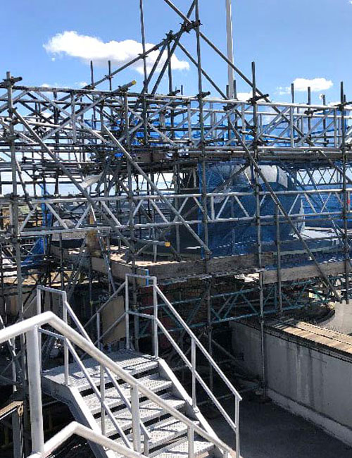 Scaffolding providing working access to the roofline of a property
