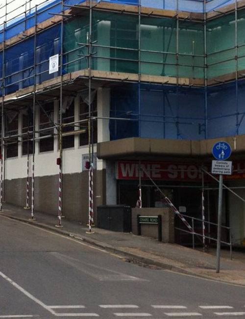 Commercial scaffolding providing access around an external building elevation
